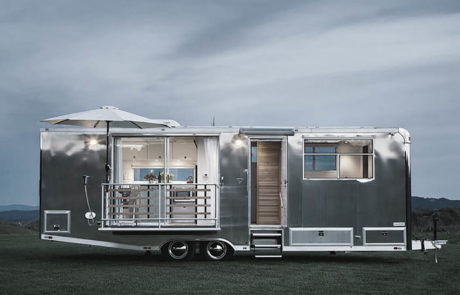 CAMPSITE-LIVING VEHICLE